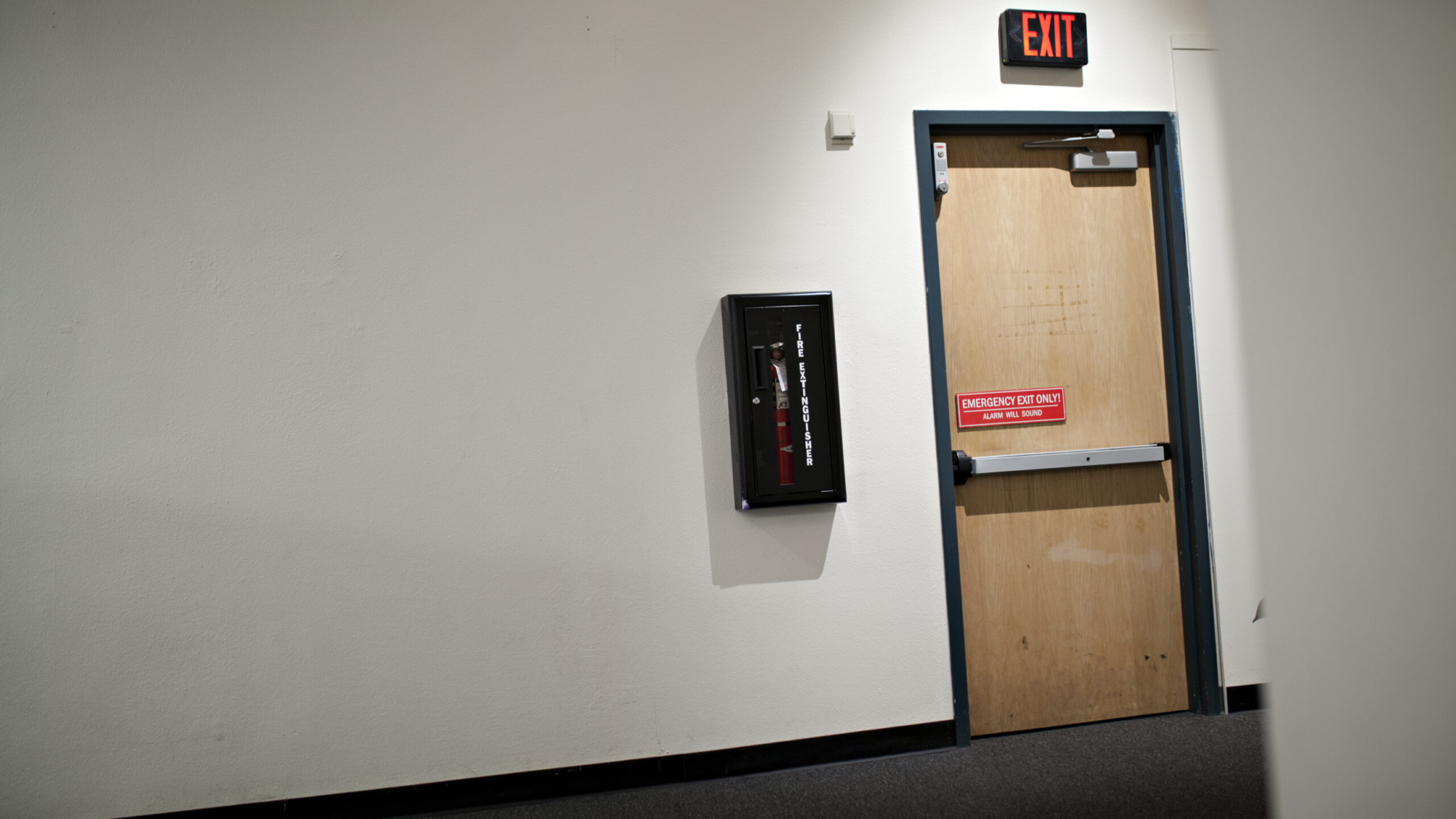 emergency-exit-alarm-and-fire-extinguisher-2021-08-30-10-33-50-utc